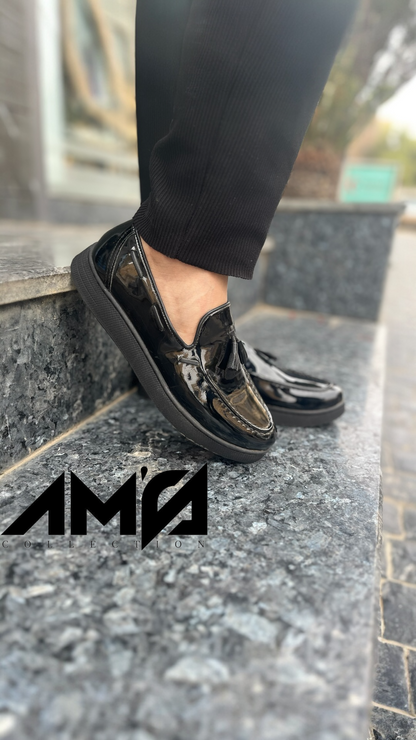 Mocassin pompon noir brillant