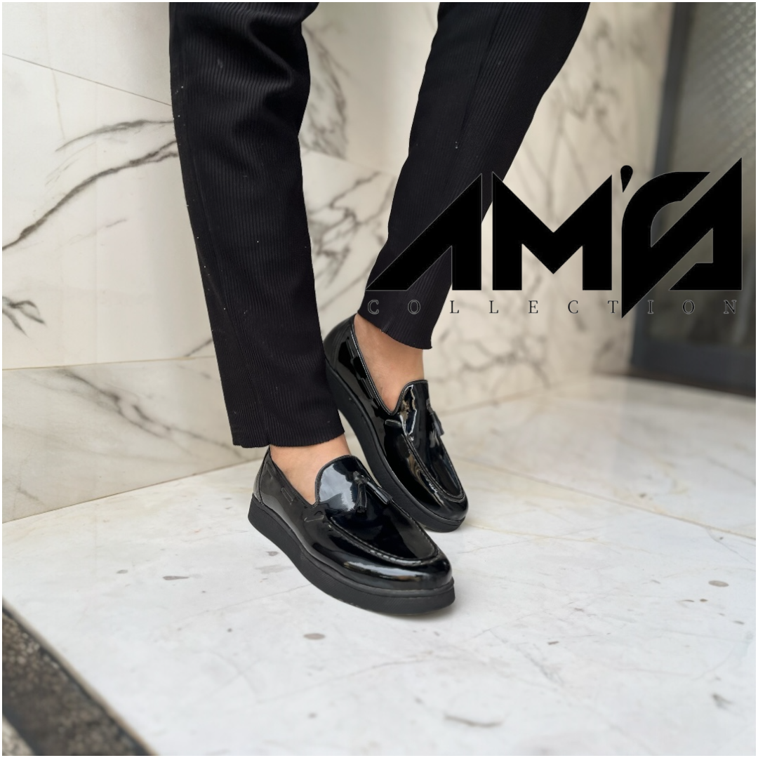 Mocassin pompon noir brillant