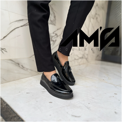 Mocassin pompon noir brillant